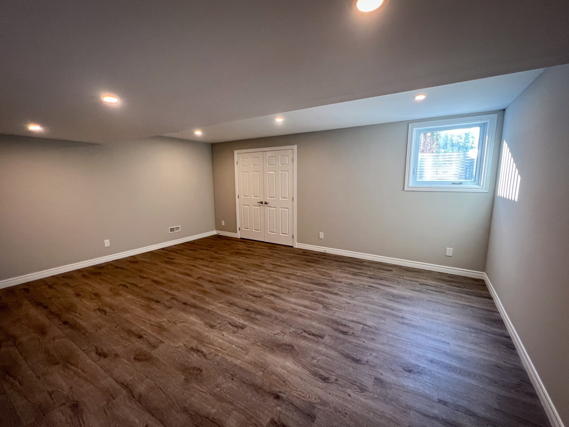Finished basement open room — Boronka Carpentry Plus
