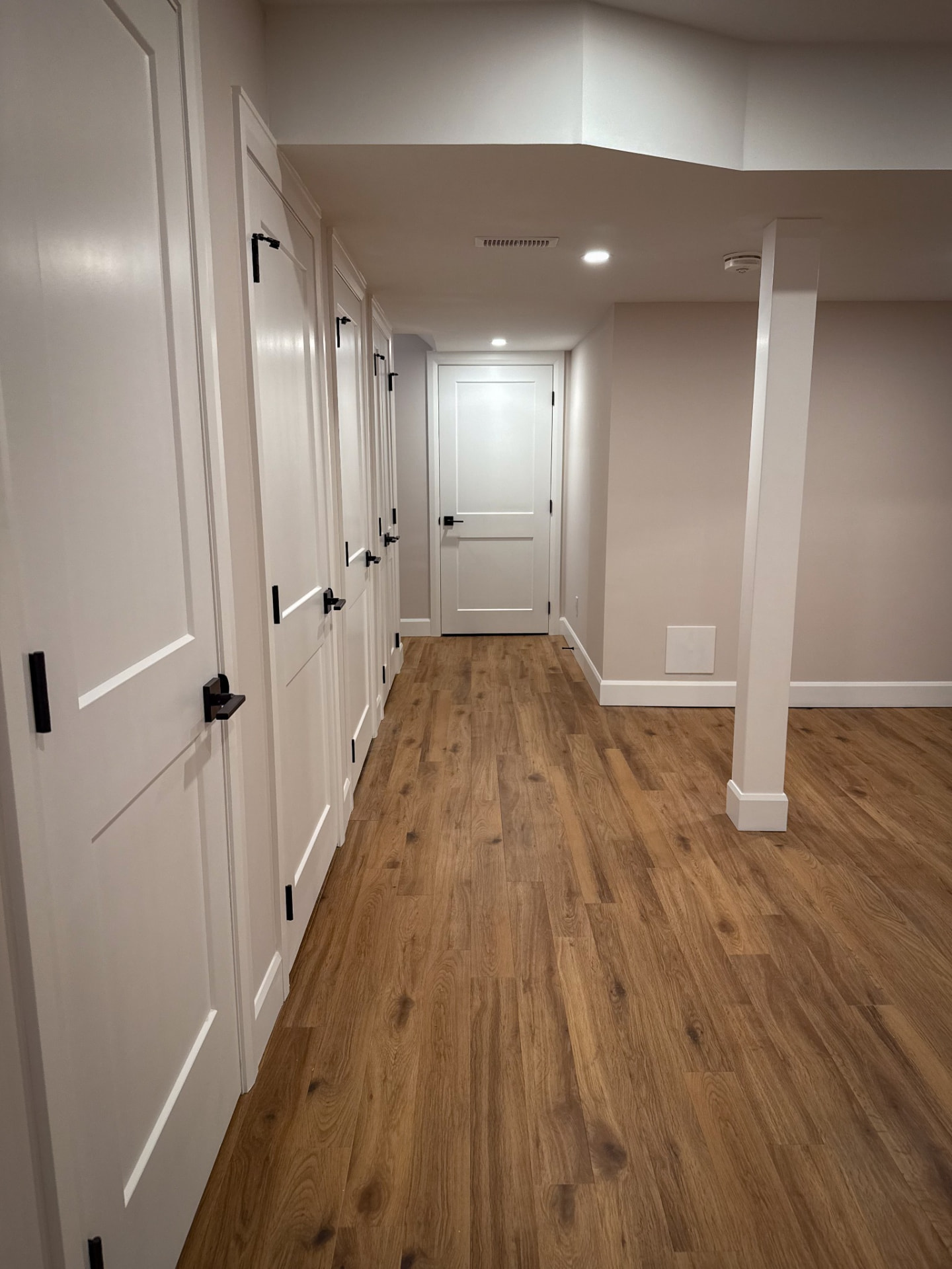 Finished basement hallway — Boronka Carpentry Plus